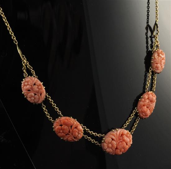 A 1920s 15ct gold and coral necklace, 16in.